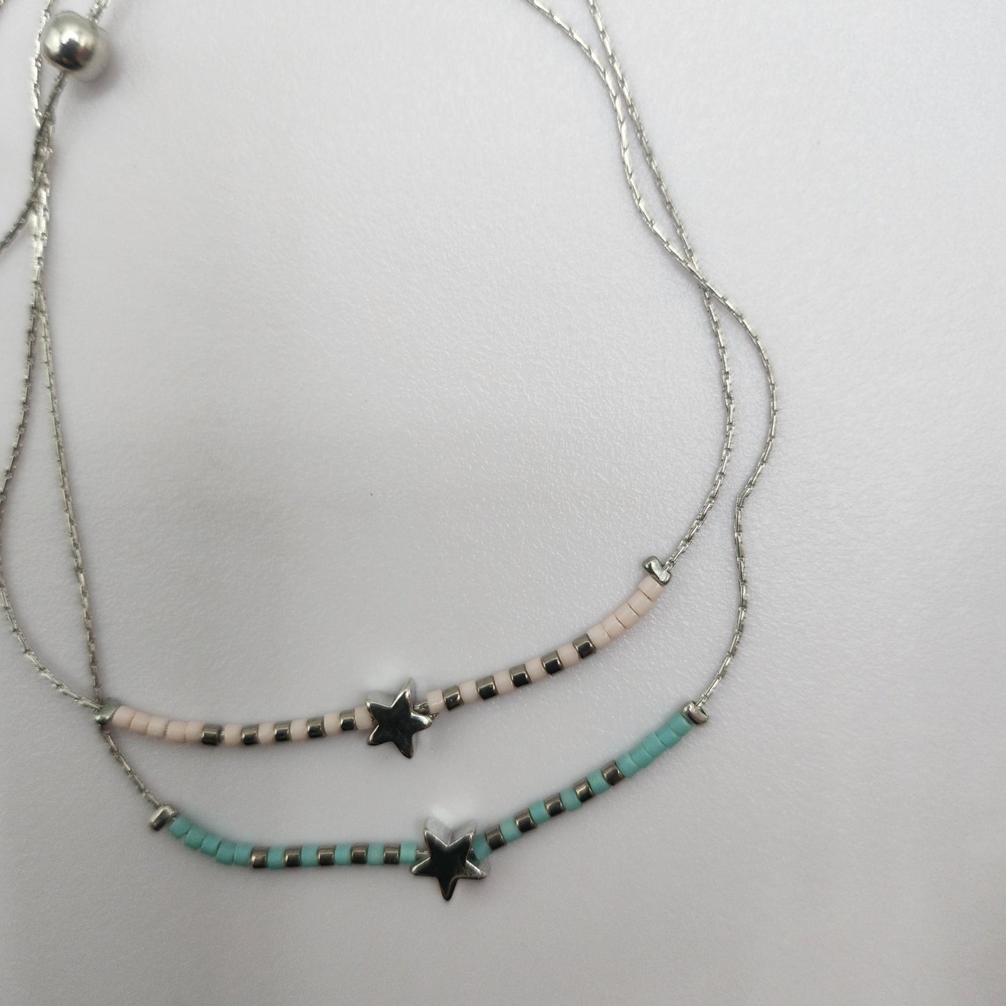 Pulseira Estrelarde Aço Inox - Azul Claro e Bege ajustável