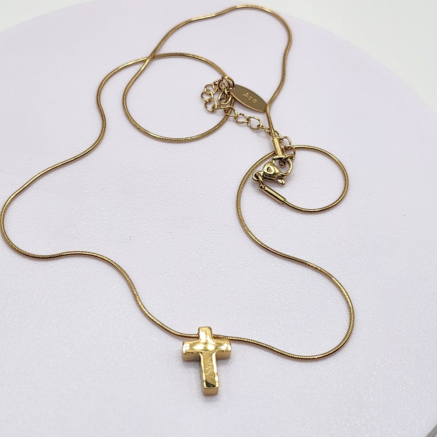 Conjunto de colar e brincos com cruz
