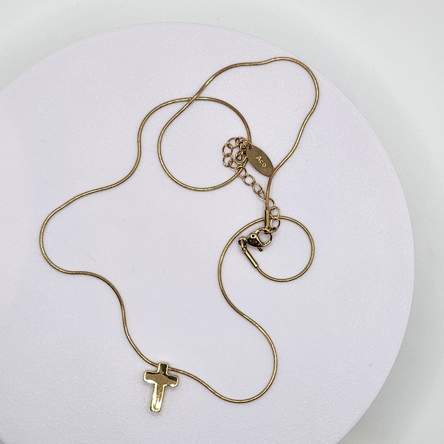 Conjunto de colar e brincos com cruz