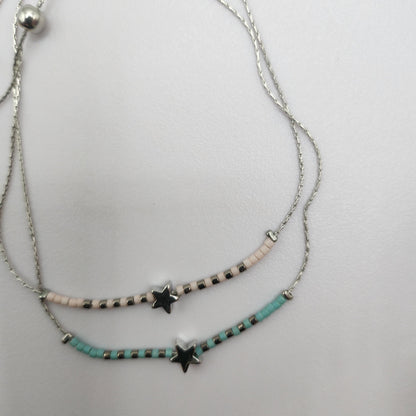 Pulseira Estrelarde Aço Inox - Azul Claro e Bege ajustável