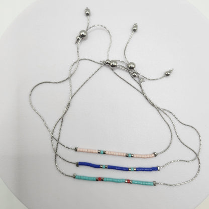 Pulseiras Prateadas e Douradas Coloridas: