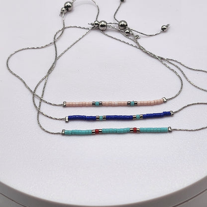 Pulseiras Prateadas e Douradas Coloridas: