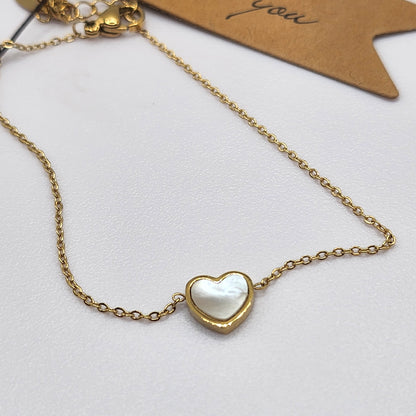 Pulseira com Coração de madrepérola dourada em Aço Inox
